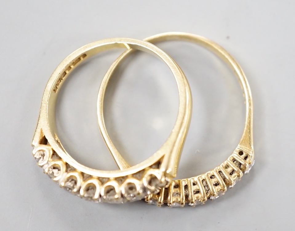 Two modern 18ct gold and seven stone diamond set half eternity rings, sizes M and Q/R, gross 5.9 grams.